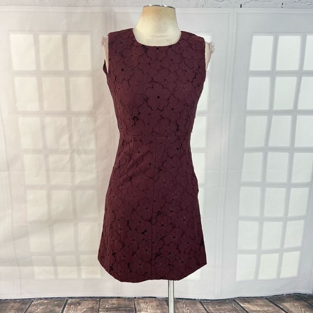 Diane Von Furstenberg sleeveless burgundy lace mini dress with pockets. Size 2